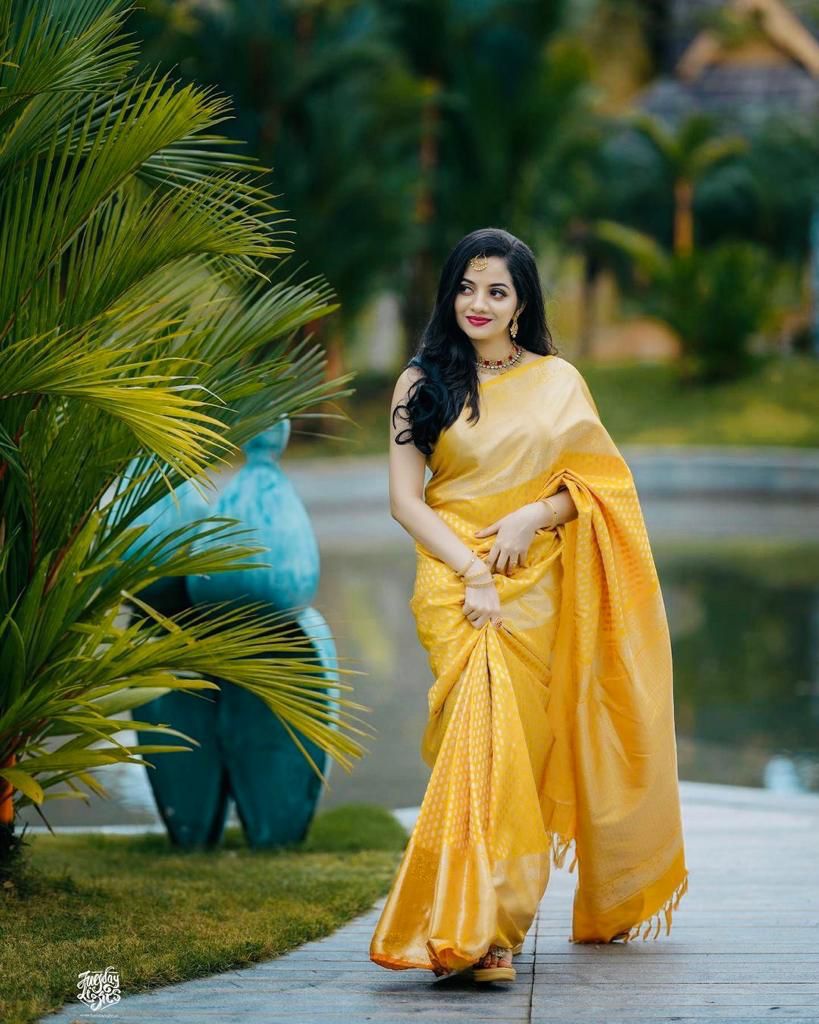 Splendorous Yellow Soft Banarasi Silk Saree With Engaging Blouse Piece