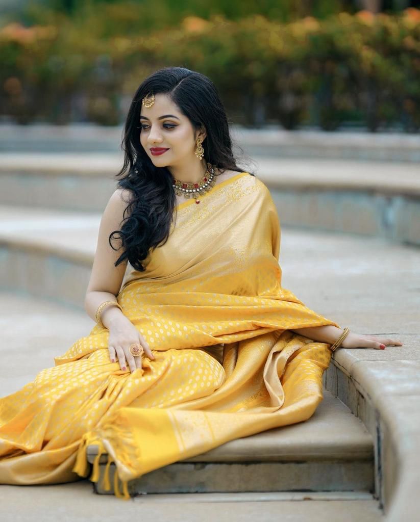 Splendorous Yellow Soft Banarasi Silk Saree With Engaging Blouse Piece