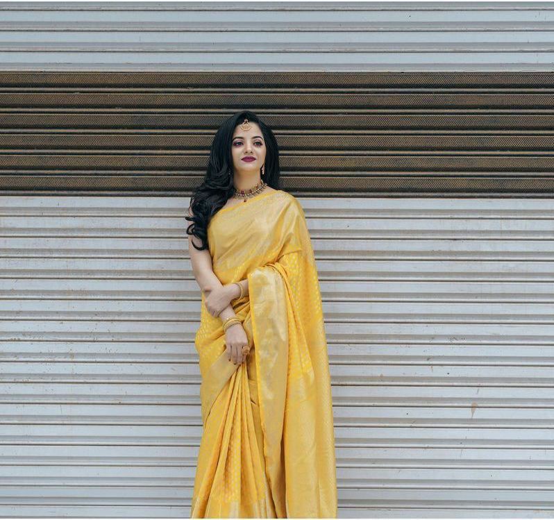 Splendorous Yellow Soft Banarasi Silk Saree With Engaging Blouse Piece