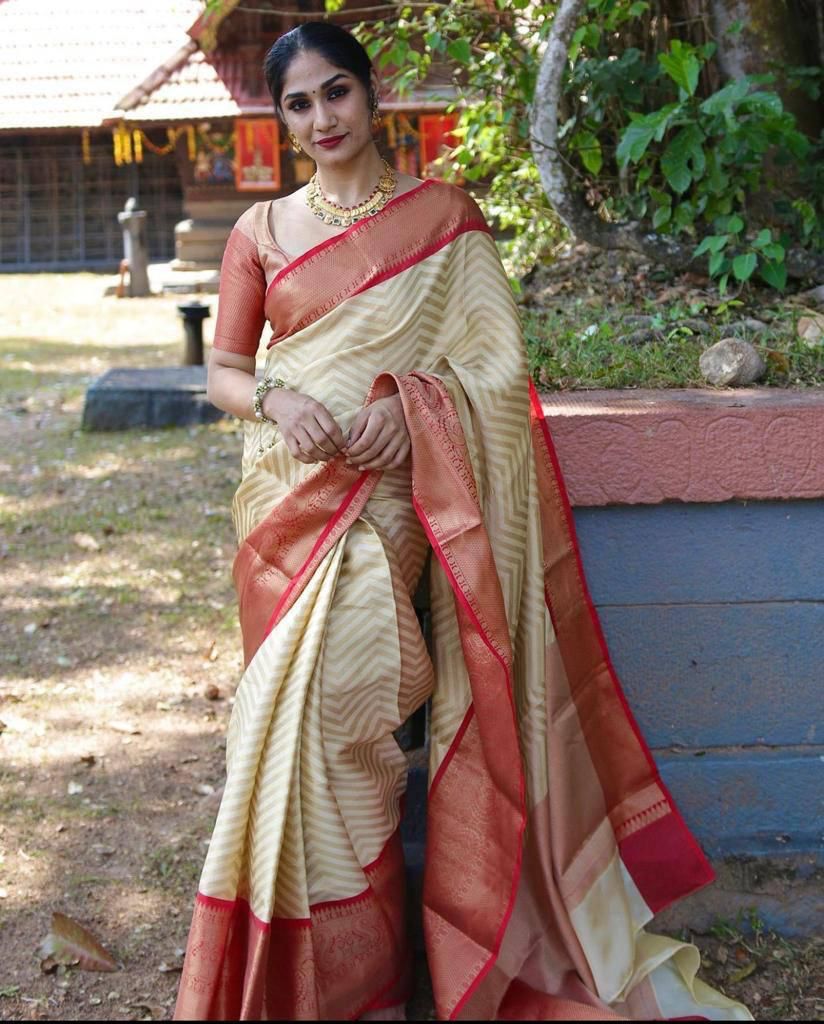 Adoring Beige Soft Banarasi Silk Saree With Fugacious Blouse Piece