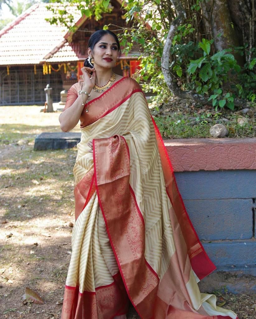 Adoring Beige Soft Banarasi Silk Saree With Fugacious Blouse Piece