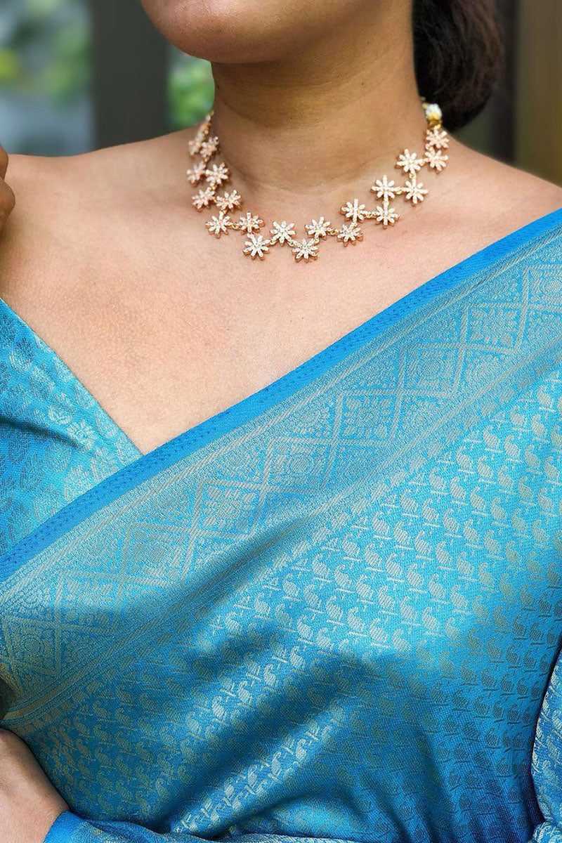 Ethereal Firozi Soft Silk Saree With Innovative Blouse Piece