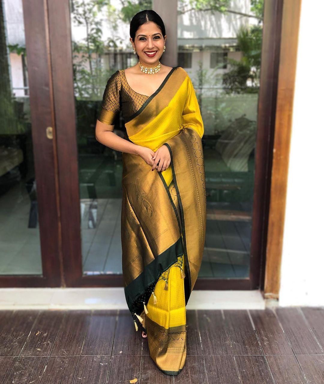 Nectarous yellow Soft Banarasi Silk Saree With Evanescent Blouse Piece