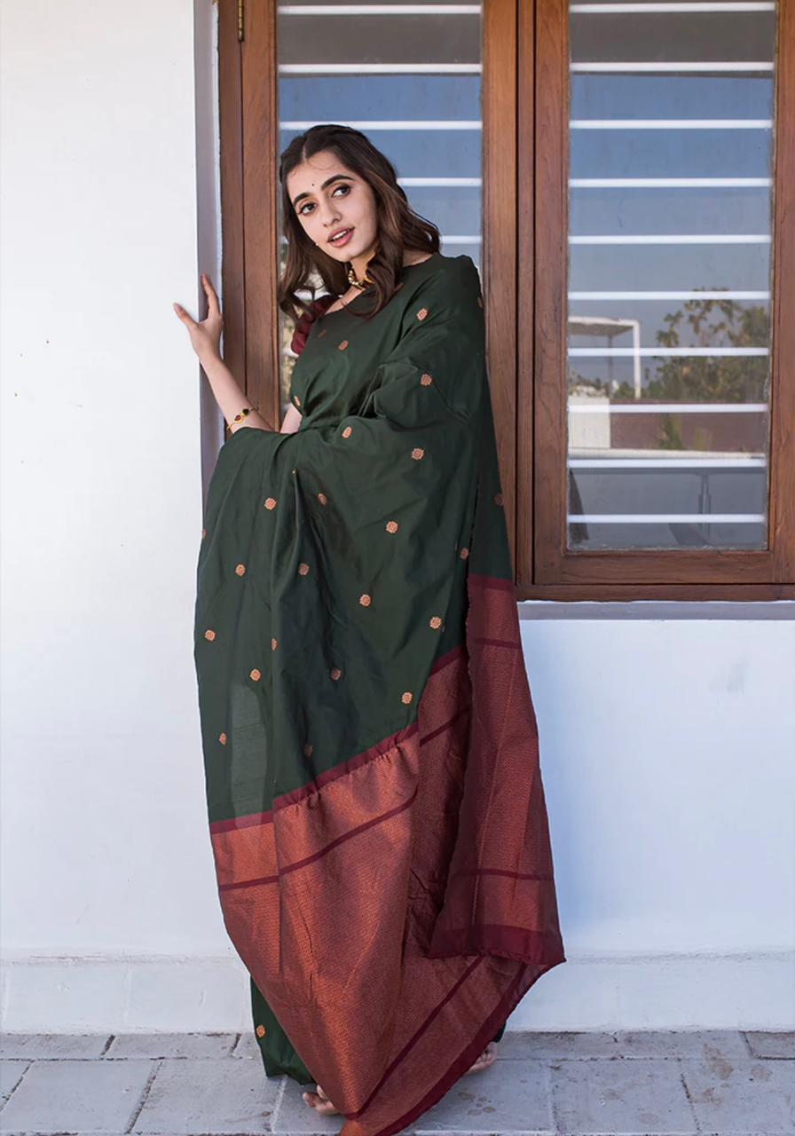 Embrocation Dark Green Soft Silk Saree With Admirable Blouse Piece