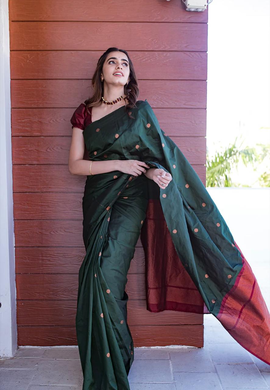 Embrocation Dark Green Soft Silk Saree With Admirable Blouse Piece