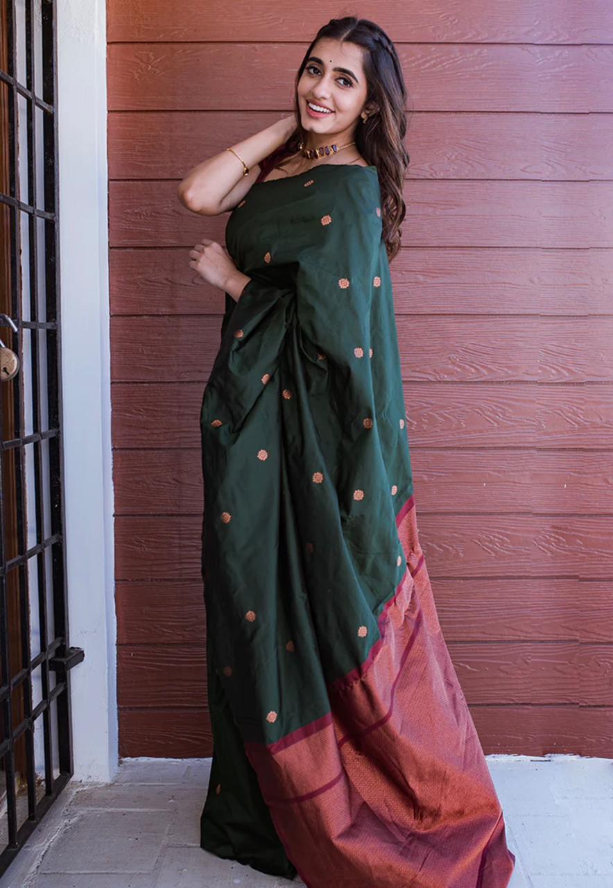 Embrocation Dark Green Soft Silk Saree With Admirable Blouse Piece