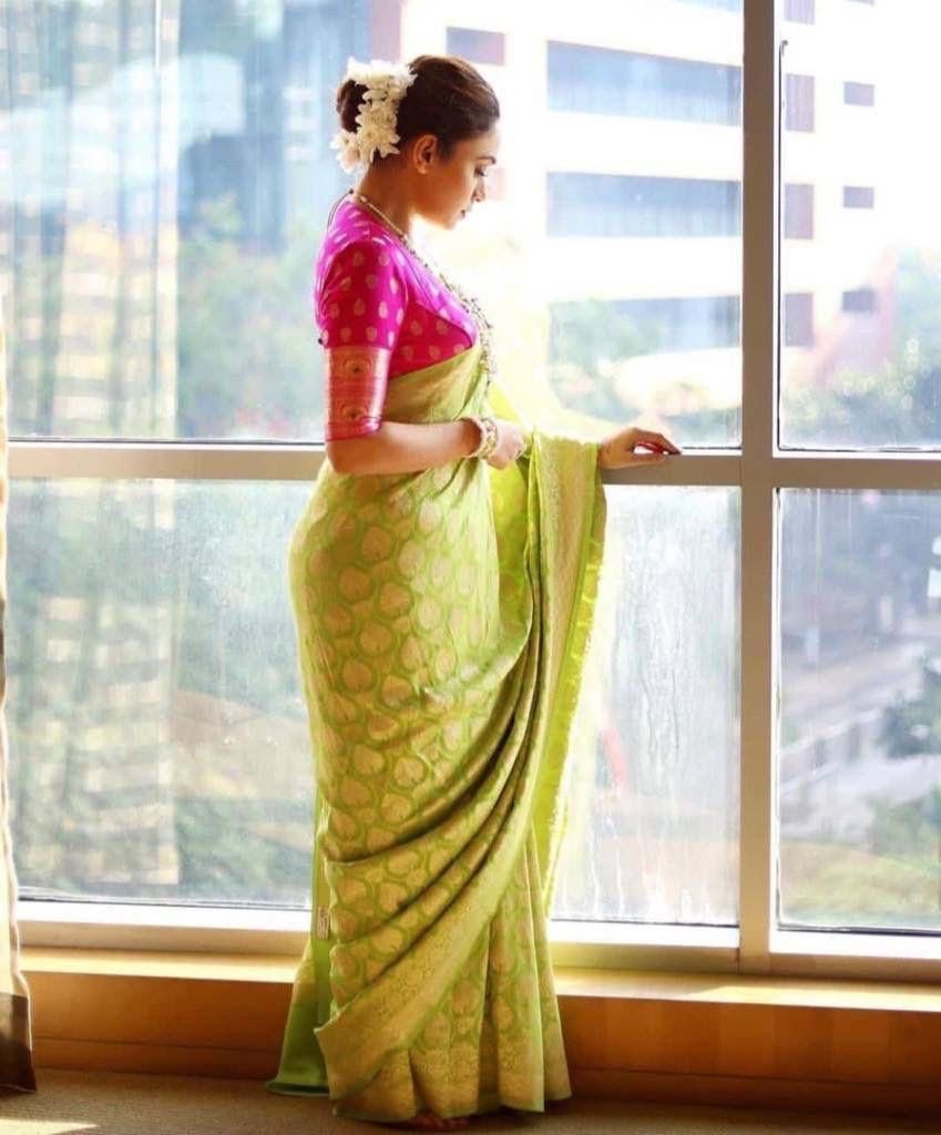 Sizzling Parrot Soft Silk Saree With Phenomenal Blouse Piece