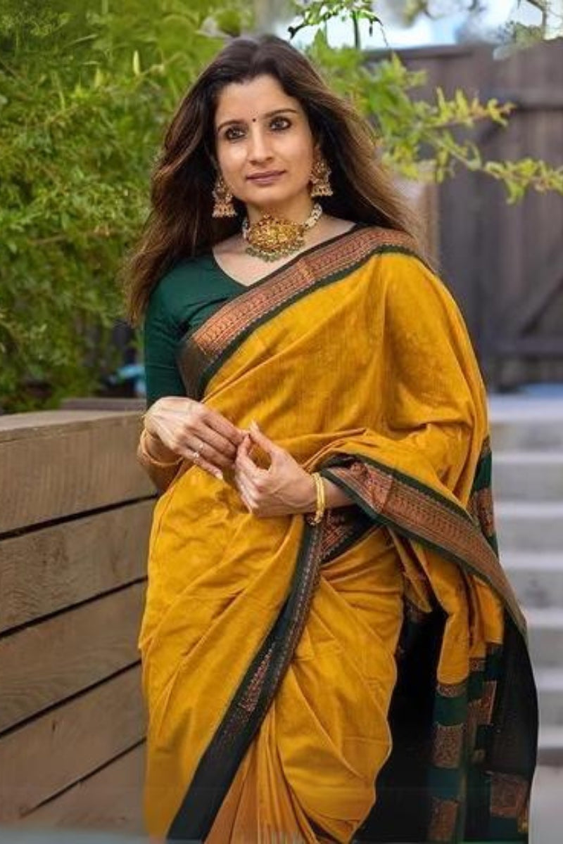 Preferable Mustard Soft Silk Saree With Attractive Blouse Piece