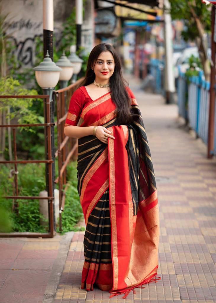 Beautiful Black Soft Silk Saree With Delightful Blouse Piece