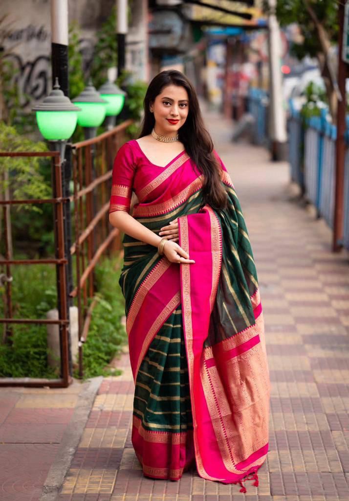 Forbearance Dark Green Soft Silk Saree With Innovative Blouse Piece