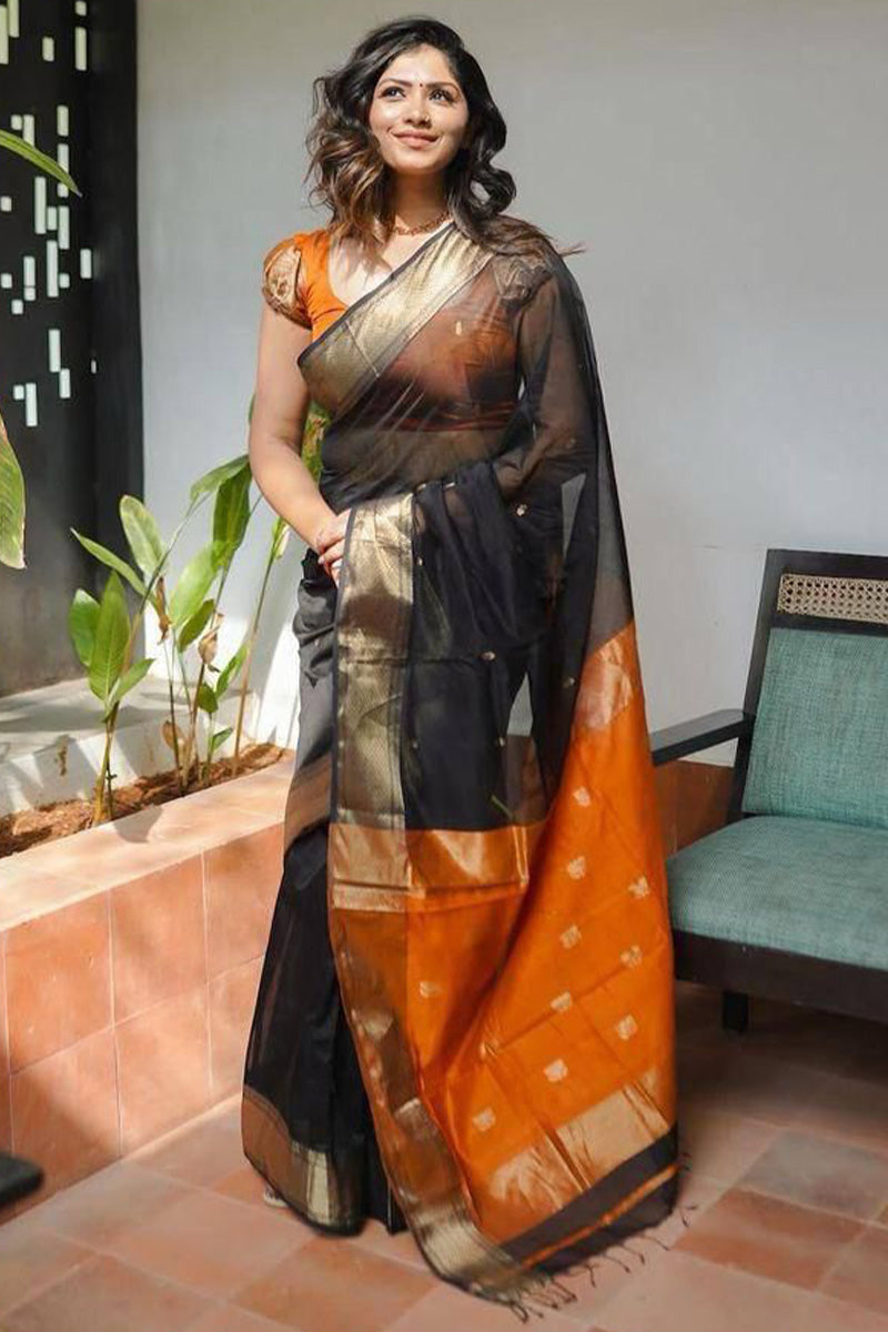 Glamorous Black Cotton Silk Saree With Quixotic Blouse Piece