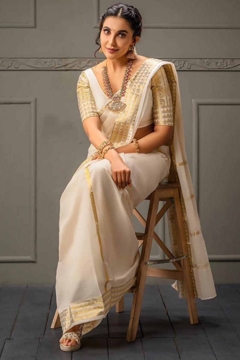 Engrossing Off White Soft Silk Saree With Palimpsest Blouse Piece