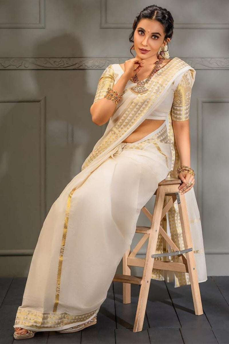 Engrossing Off White Soft Silk Saree With Palimpsest Blouse Piece