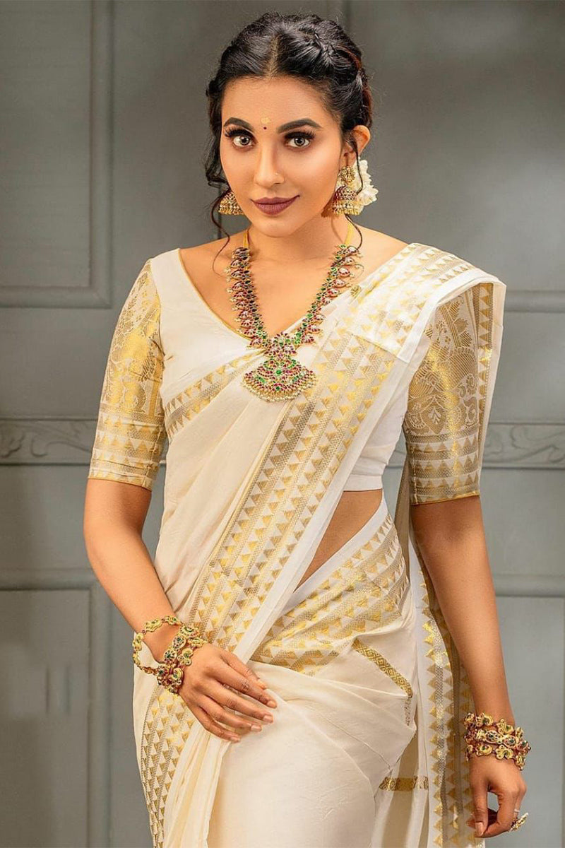 Engrossing Off White Soft Silk Saree With Palimpsest Blouse Piece