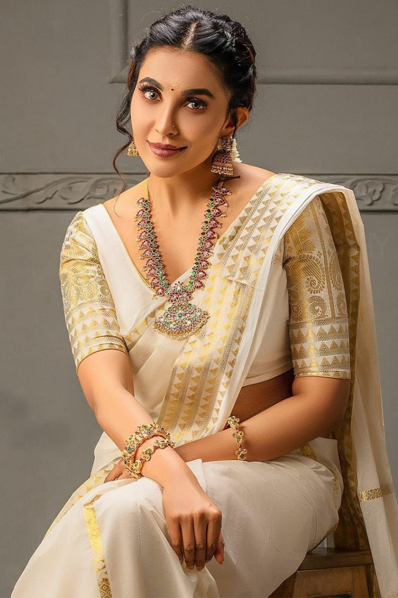 Engrossing Off White Soft Silk Saree With Palimpsest Blouse Piece