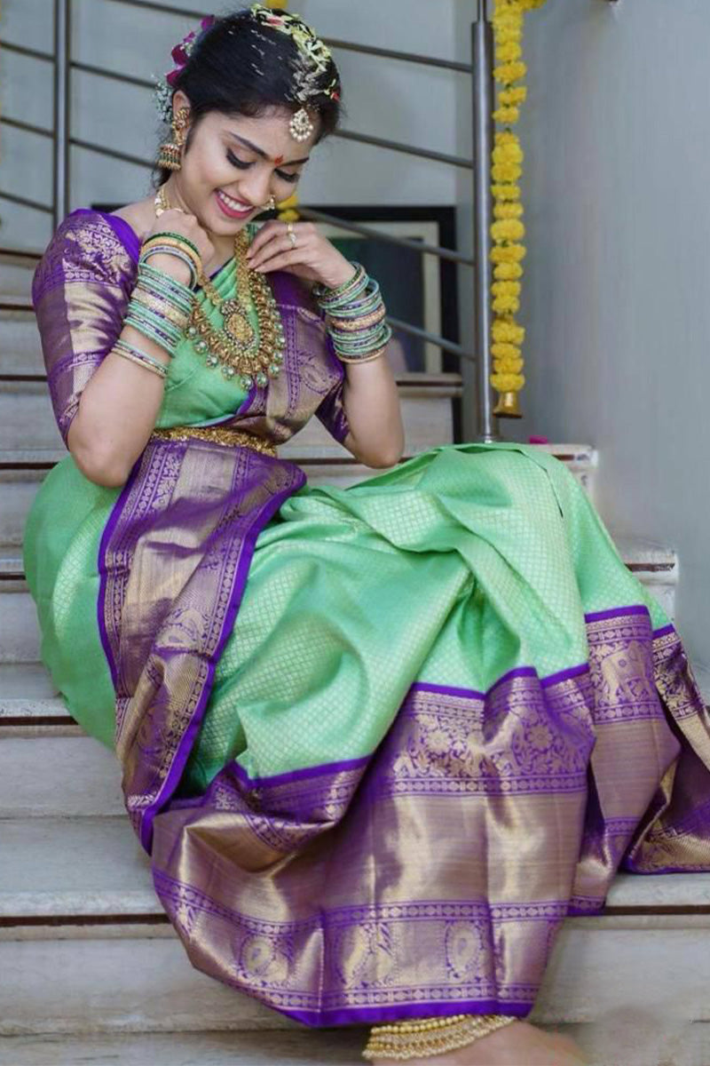 Elision Sea Green Soft Silk Saree With Flameboyant Blouse Piece