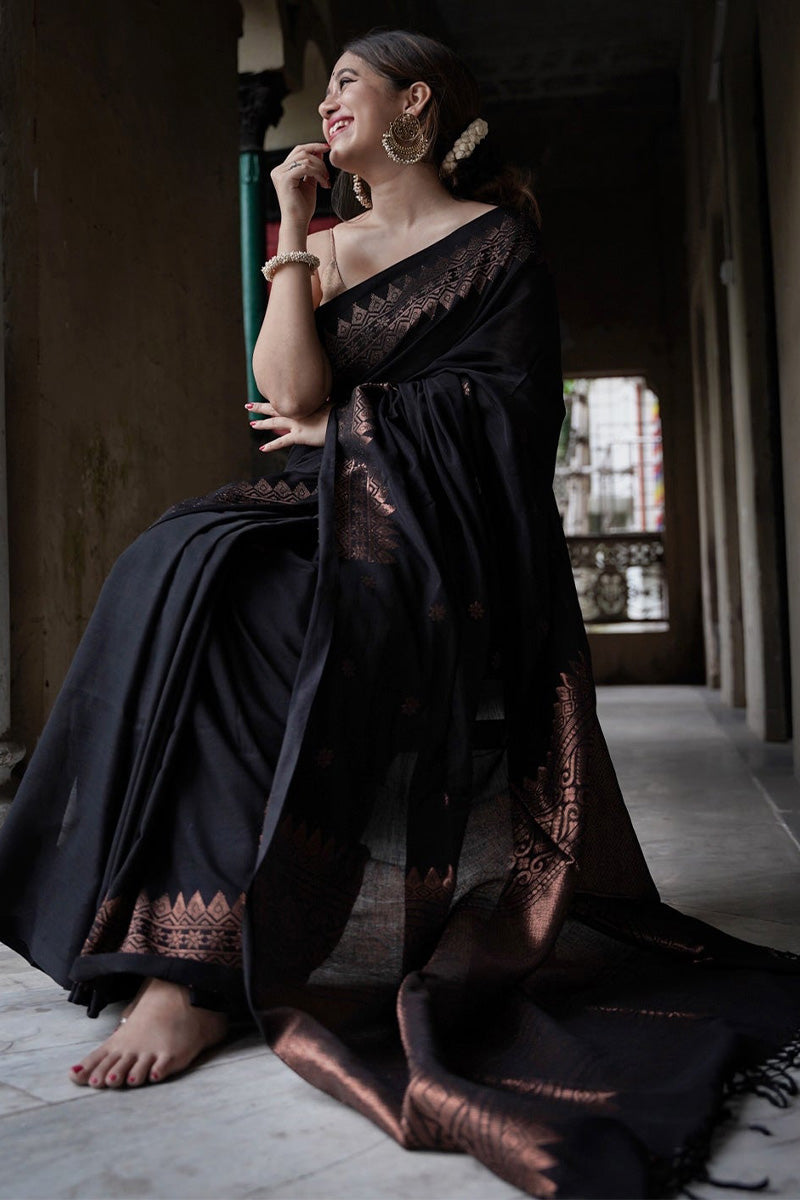 Embrocation Black Soft Silk Saree With Jazzy Blouse Piece