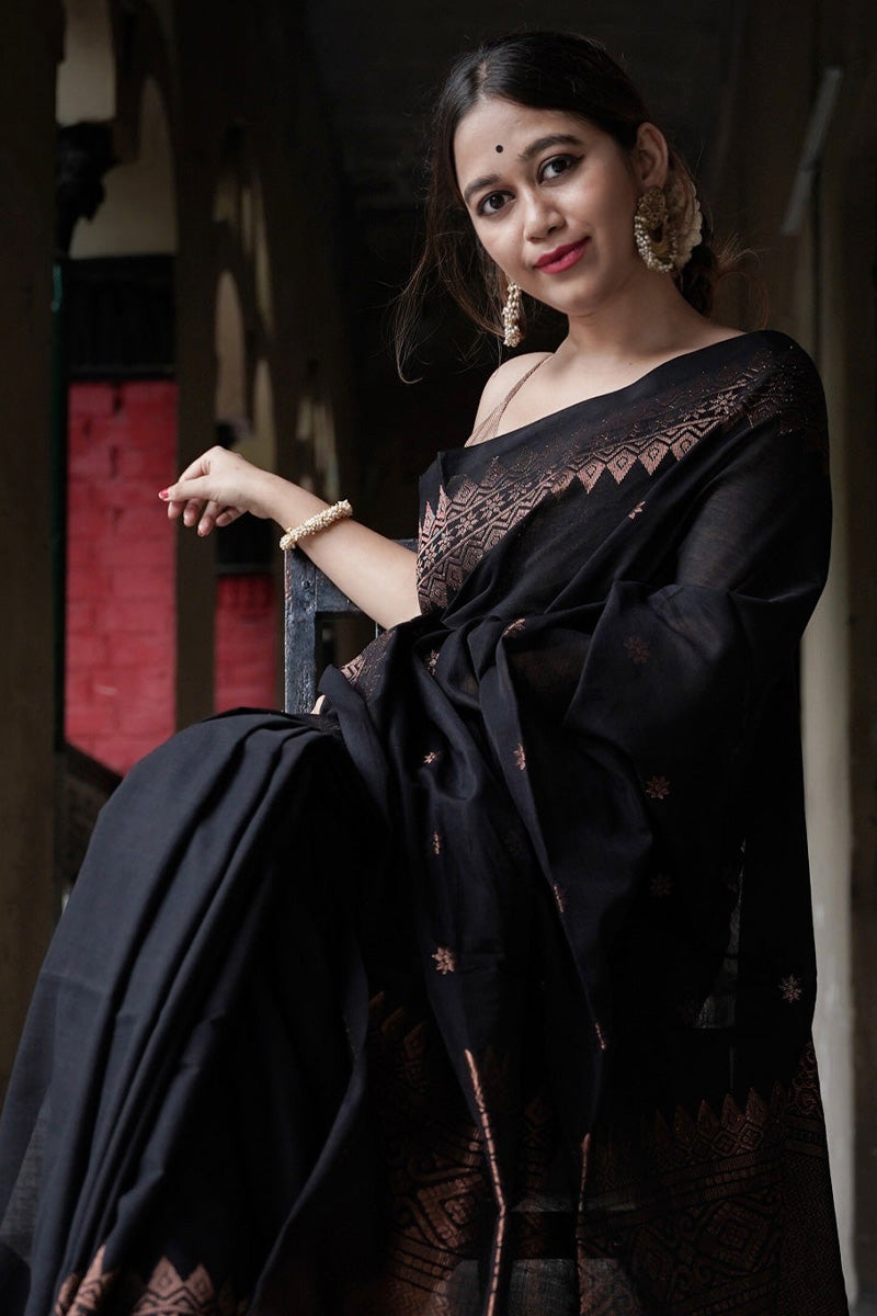 Embrocation Black Soft Silk Saree With Jazzy Blouse Piece