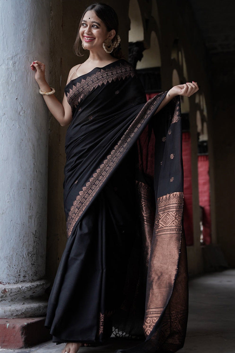 Embrocation Black Soft Silk Saree With Jazzy Blouse Piece