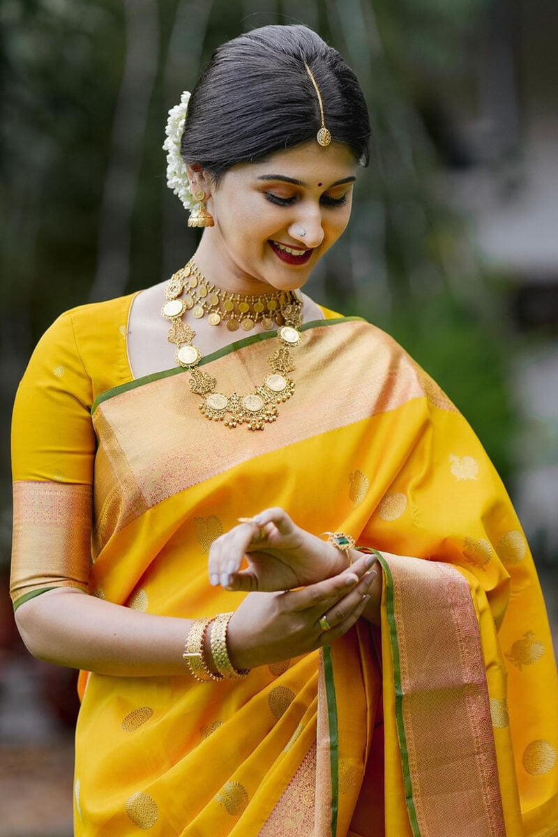 Stunner Yellow Soft Silk Saree With Radiant Blouse Piece