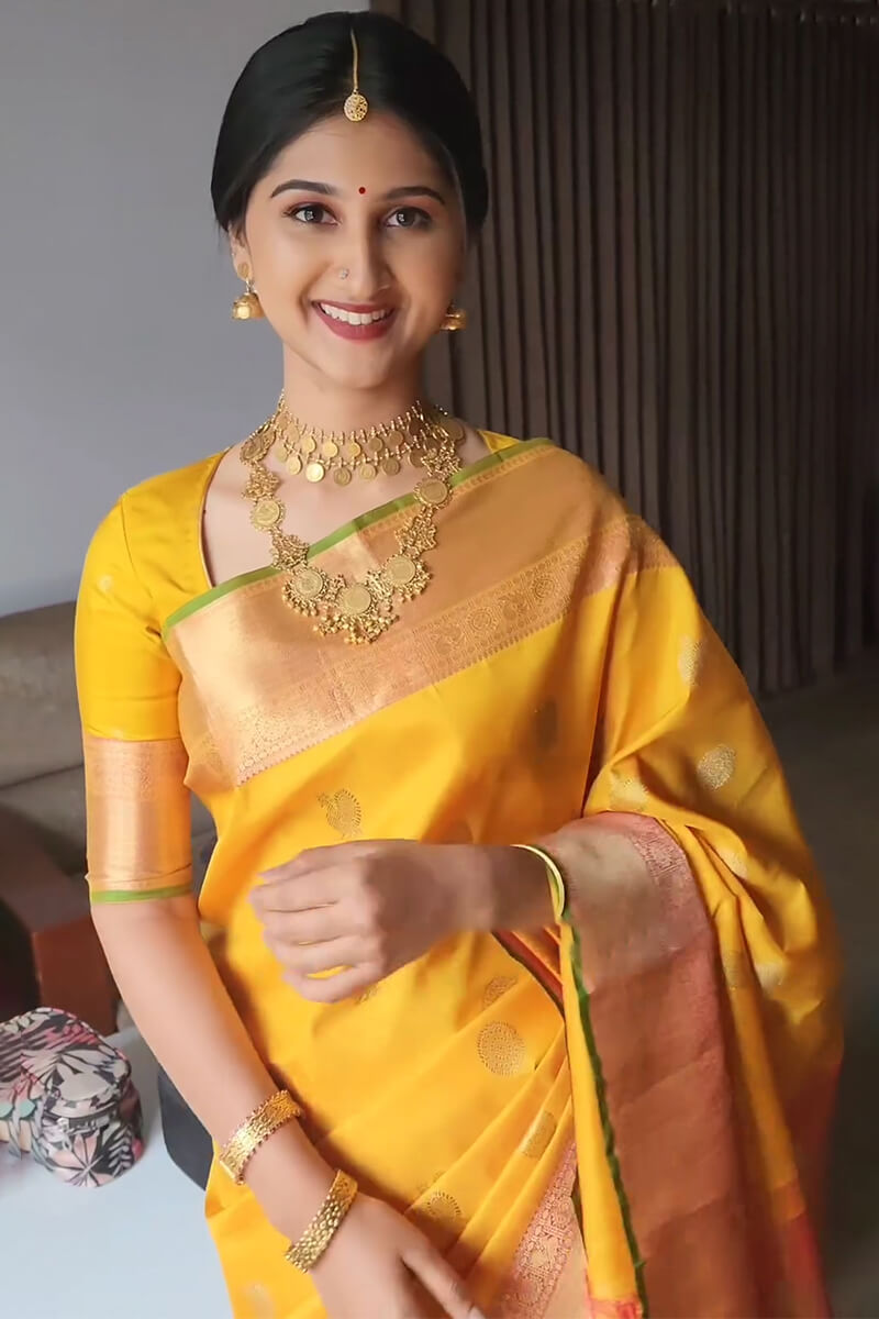 Stunner Yellow Soft Silk Saree With Radiant Blouse Piece