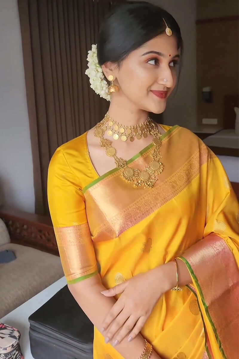 Stunner Yellow Soft Silk Saree With Radiant Blouse Piece