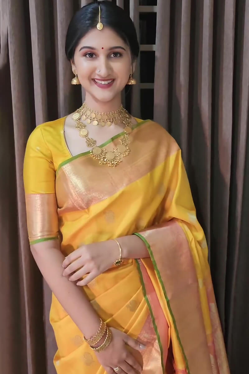 Stunner Yellow Soft Silk Saree With Radiant Blouse Piece