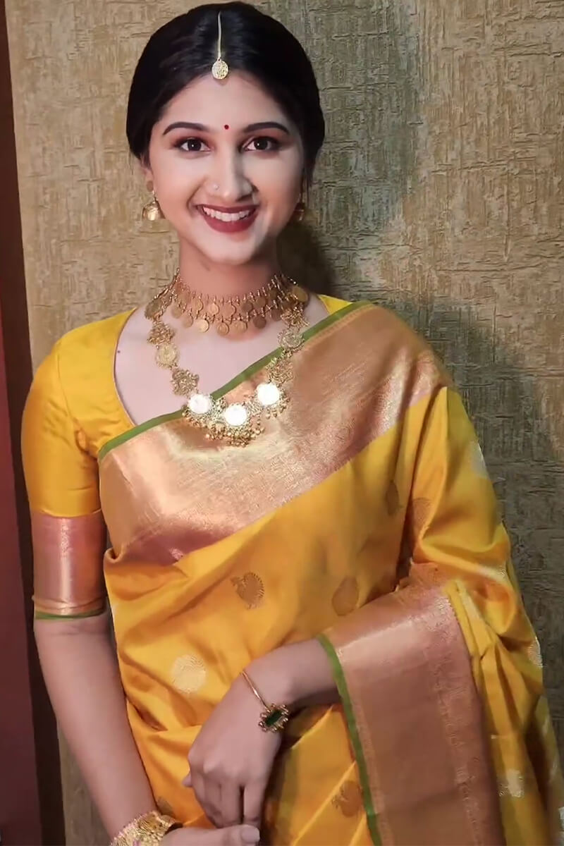 Stunner Yellow Soft Silk Saree With Radiant Blouse Piece