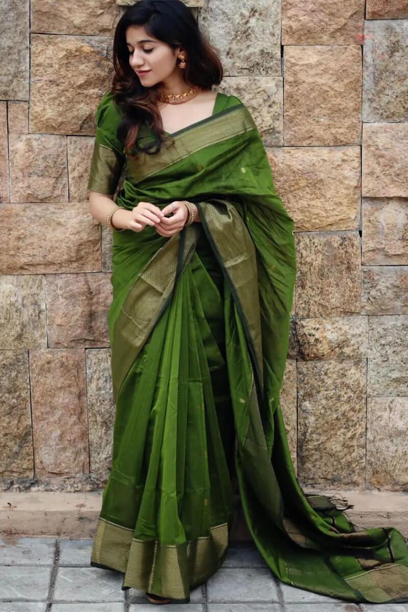 Unique Green Cotton Silk Saree With Gleaming Blouse Piece