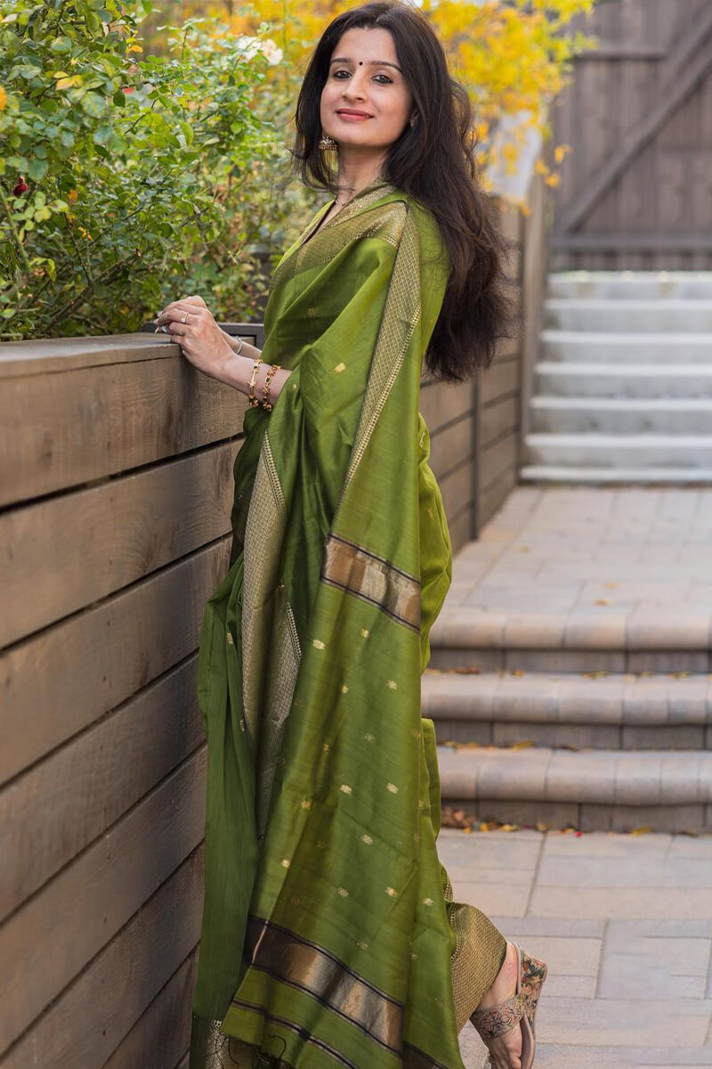 Flattering Green Cotton Silk Saree With Prominent Blouse Piece