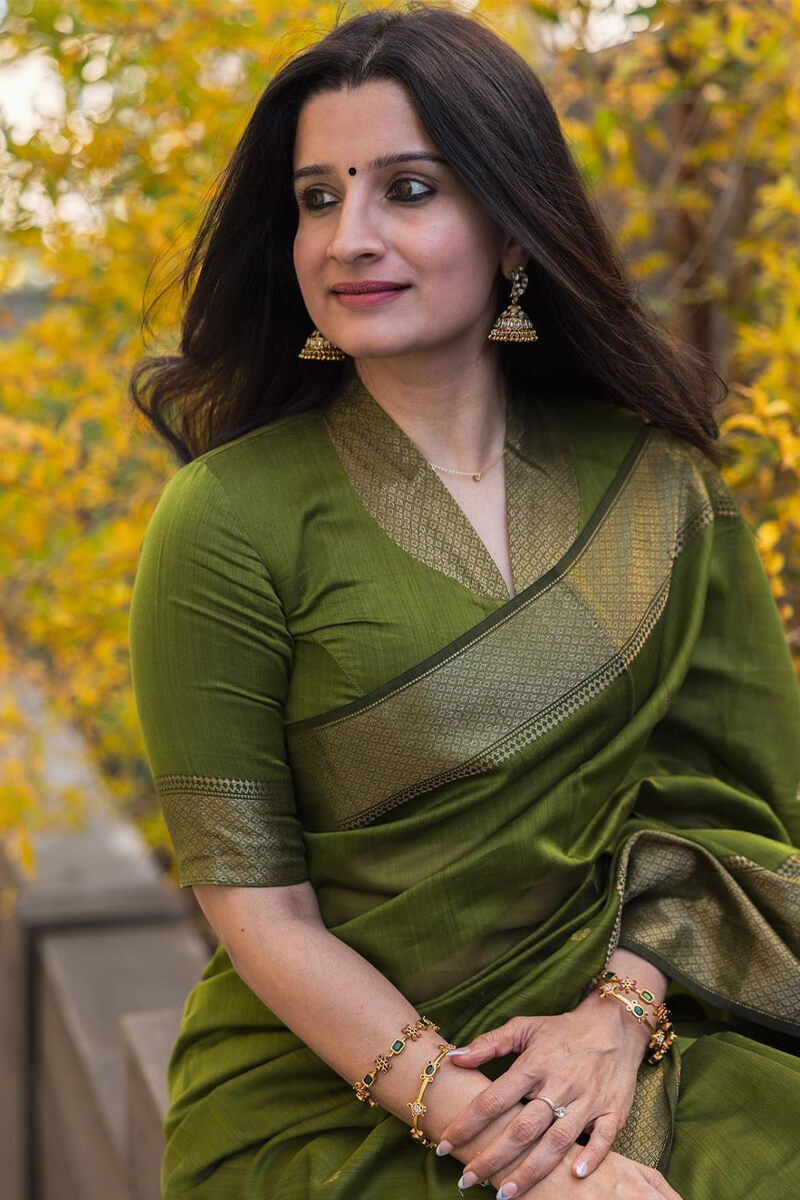 Flattering Green Cotton Silk Saree With Prominent Blouse Piece