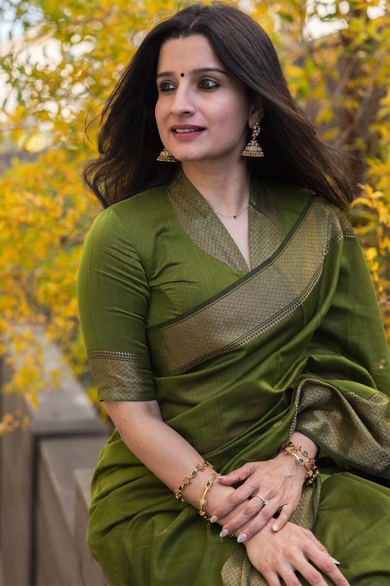 Flattering Green Cotton Silk Saree With Prominent Blouse Piece