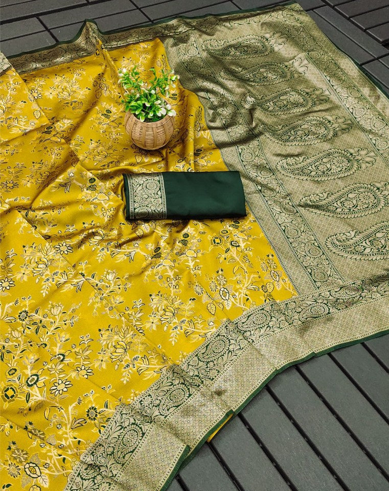 Engaging Yellow Soft Silk Saree With Tempting Blouse Piece