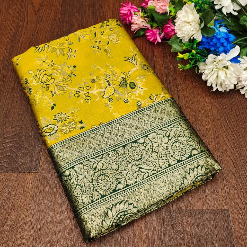 Engaging Yellow Soft Silk Saree With Tempting Blouse Piece