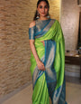 Effulgent Parrot Soft Silk Saree With Resplendent Blouse Piece