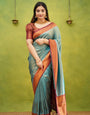 Exuberant Firozi Soft Banarasi Silk Saree With Most Blouse Piece