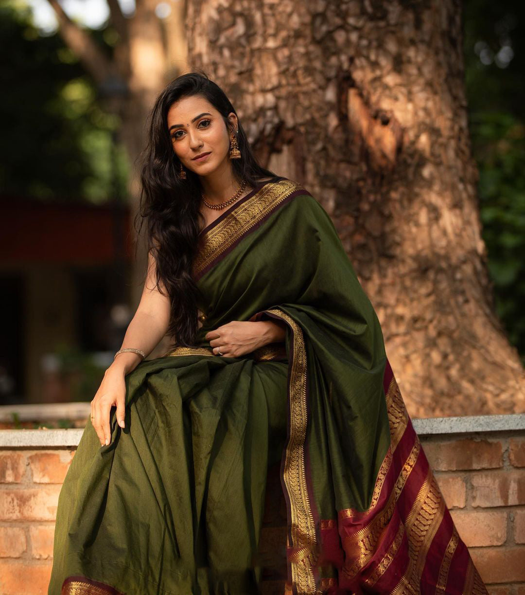 Adorning Green Soft Banarasi Silk Saree With Confounding Blouse Piece