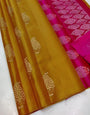 Enchanting Mustard Soft Silk Saree With Demanding Blouse Piece