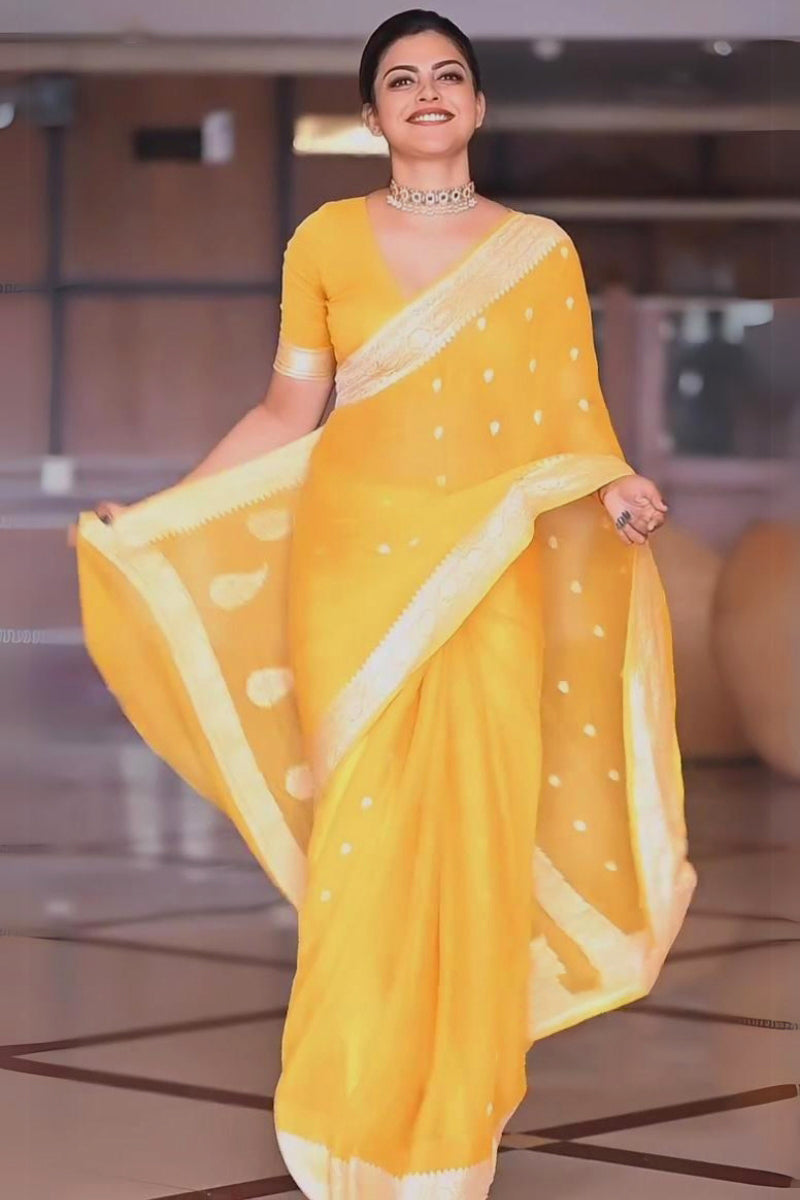 Snazzy Yellow Soft Silk Saree With Skinny Blouse Piece