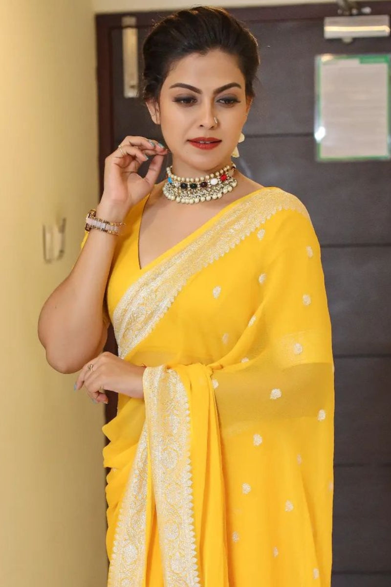 Snazzy Yellow Soft Silk Saree With Skinny Blouse Piece