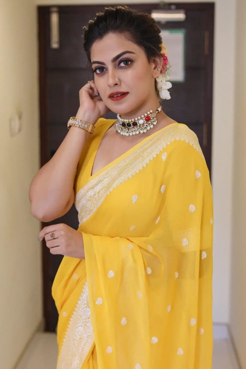 Snazzy Yellow Soft Silk Saree With Skinny Blouse Piece