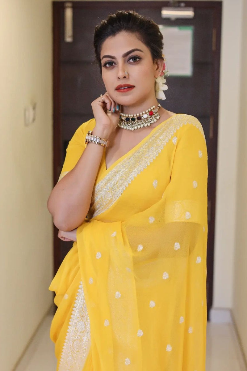 Snazzy Yellow Soft Silk Saree With Skinny Blouse Piece