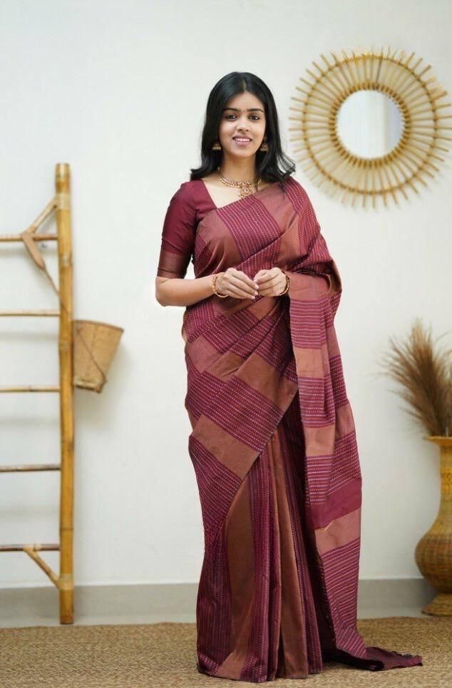 Quixotic Maroon Soft Silk Saree With Engrossing Blouse Piece