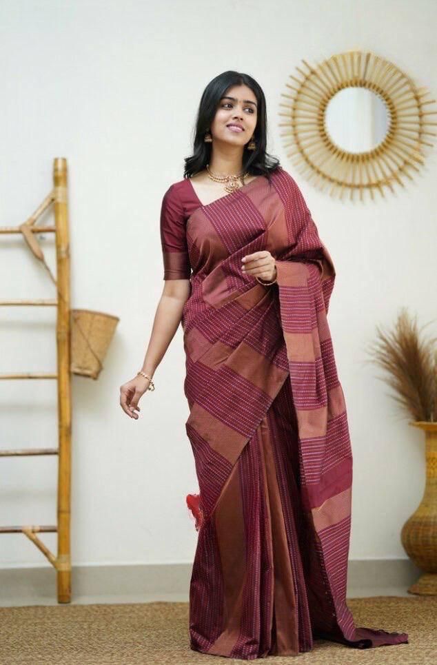 Quixotic Maroon Soft Silk Saree With Engrossing Blouse Piece