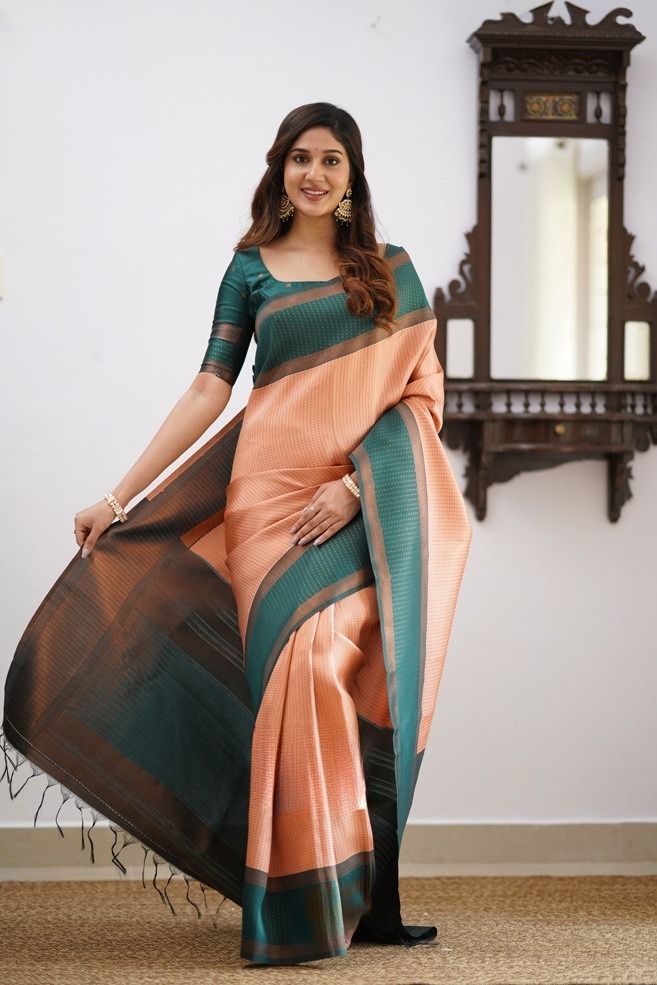 Demure Peach Soft Silk Saree With Scintilla Blouse Piece