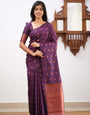 Engaging Purple Soft Silk Saree With Demure Blouse Piece