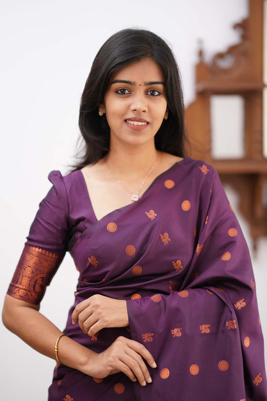 Engaging Purple Soft Silk Saree With Demure Blouse Piece