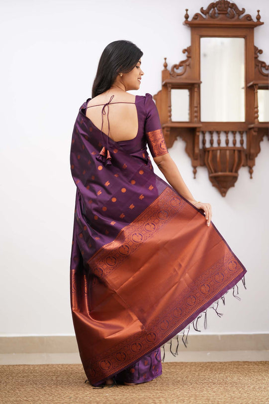 Engaging Purple Soft Silk Saree With Demure Blouse Piece