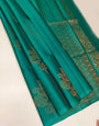 Blissful Firozi Soft Silk Saree With Nemesis Blouse Piece