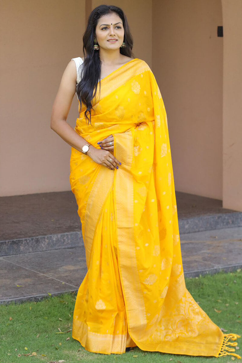 Nemesis Yellow Soft Banarasi Silk Saree With Delectable Blouse Pieced